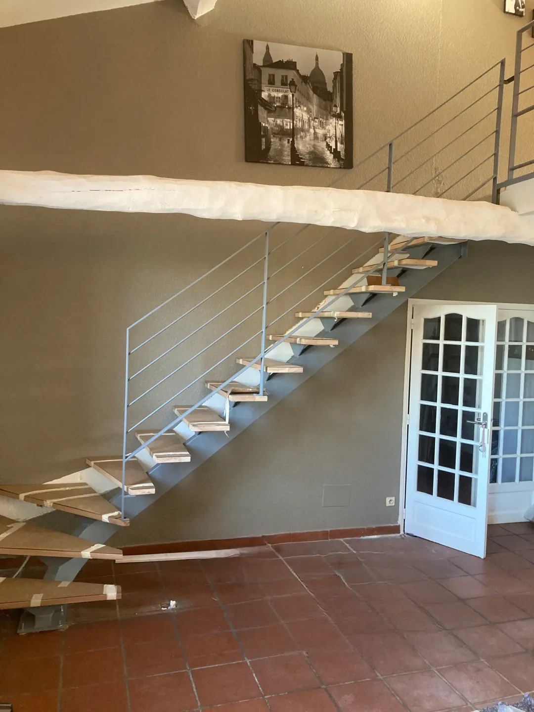 Escalier limon central métal marches bois Toulouse